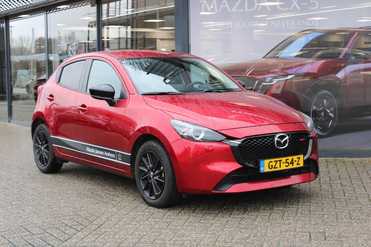 Mazda 2 1.5 e-SkyActiv-G 90 Homura , Demovoordeel ¤4.140-, Apple Carplay, LMV 16 Inch, Camera, PDC, Clima, Cruise, Stuur/Stoelverwarming, BSM, LKA