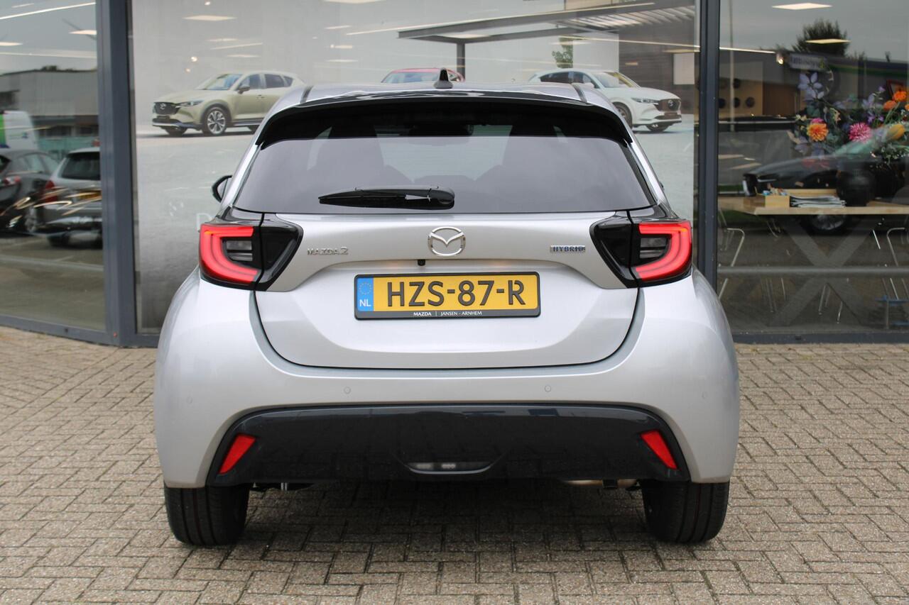 Mazda 2 Hybrid 1.5 Homura , Demovoordeel ¤ 3.000,-, Automaat, Apple Carplay, Clima, Adap.Cruise, LMV 17 Inch, Camera, PDC, Stuur/Stoelverwarming