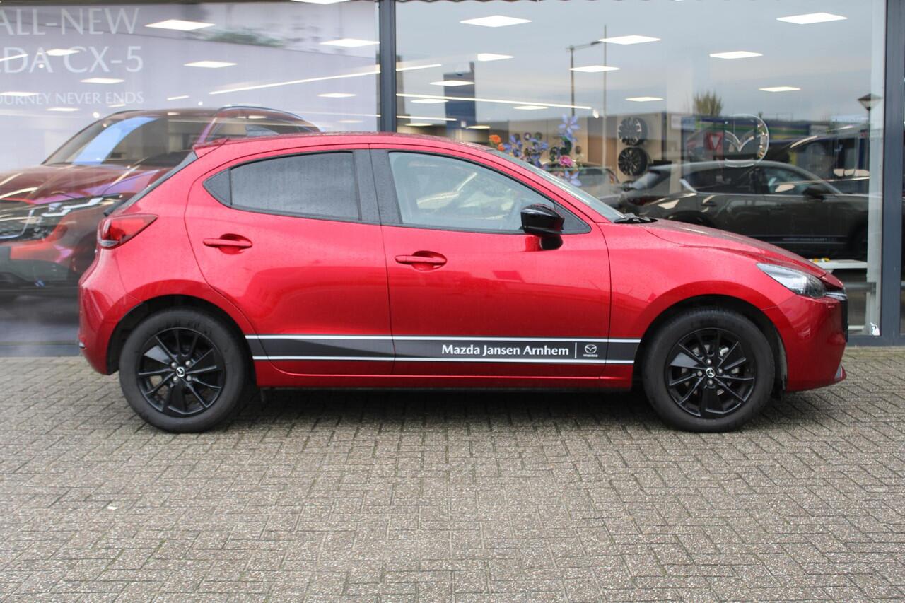 Mazda 2 1.5 e-SkyActiv-G 90 Homura , Demovoordeel ¤4.140-, Apple Carplay, LMV 16 Inch, Camera, PDC, Clima, Cruise, Stuur/Stoelverwarming, BSM, LKA