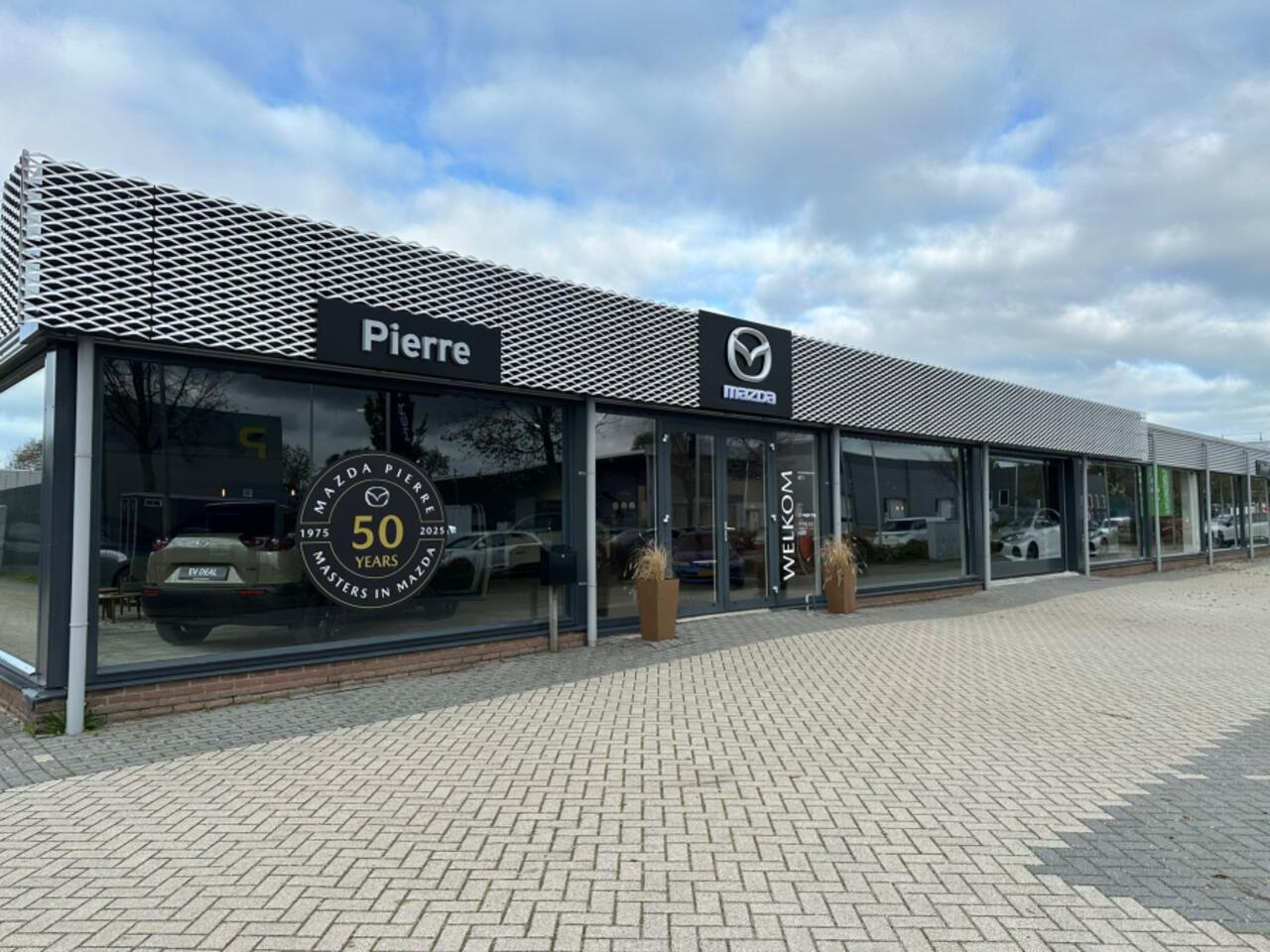 Mazda 2 Hybrid 1.5 Homura AUTOMAAT NAVI DMV APPLE CARPLAY / ANDROID | ACHTERUITRIJCAMERA | 17 INCH LMV | WINTERPAKKET 34.240,- -2500 inruilvoordeel AUTOMAAT NAVI D.M.V APPLE CARPLAY / ANDROID | ACHTERUITRIJCAMERA | 6 JAAR GARANTIE!