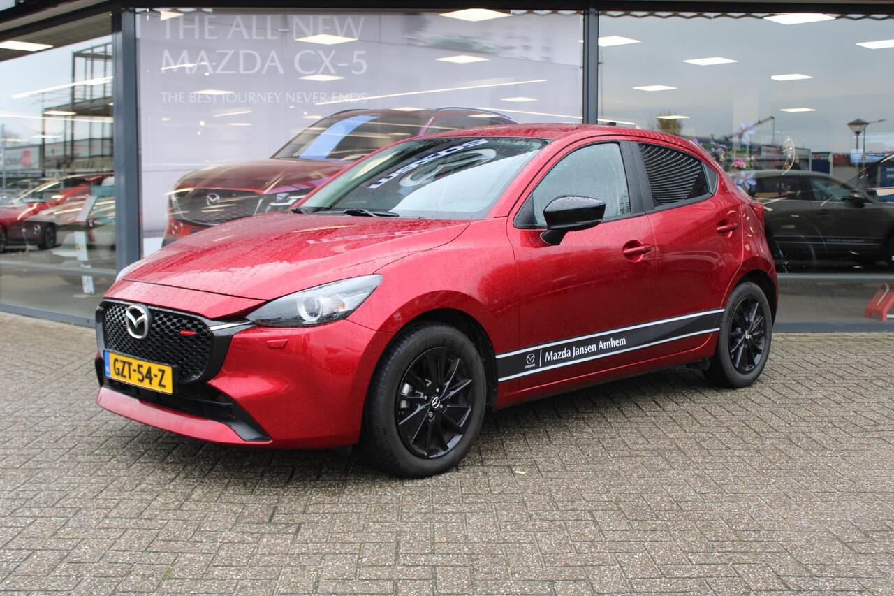 Mazda 2 1.5 e-SkyActiv-G 90 Homura , Demovoordeel ¤4.140-, Apple Carplay, LMV 16 Inch, Camera, PDC, Clima, Cruise, Stuur/Stoelverwarming, BSM, LKA