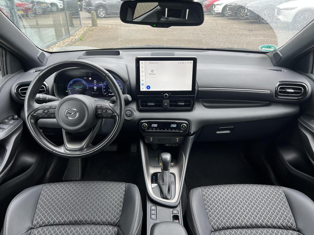 Mazda 2 Hybrid 1.5 Homura Plus AUTOMAAT | STOEL- EN STUURVERWARMING | PARKEERSENSOREN V+A | ACHTERUITRIJCAMERA | DODEHOEKDETECTIE | NAVIGATIE | CARPLAY | DRAADLOZE TELEFOONLADER | DIGITAAL DASHBOARD | KEYLESS |
