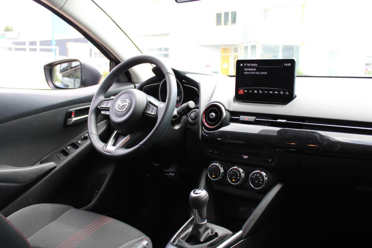 Mazda 2 1.5 e-SkyActiv-G 90 Homura Demovoordeel ¤4.140 -, Apple Carplay, LMV 16 Inch, Camera, PDC, Clima, Cruise, Stuur/Stoelverwarming, BSM, LKA