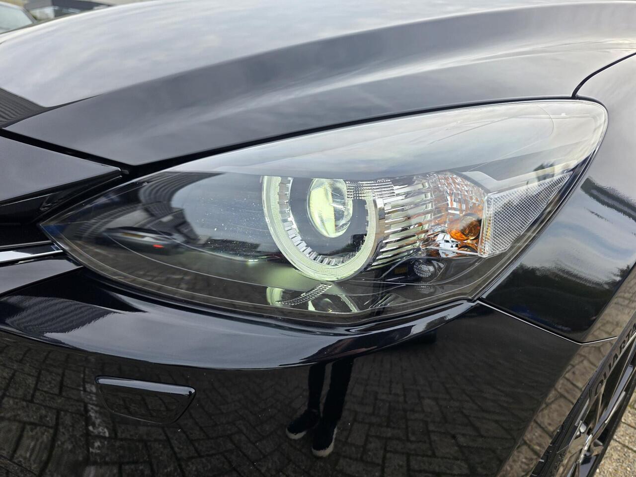 Mazda 2 1.5 e-SkyActiv-G 90 Homura | Achteruitrijcamera | Applecarplay en android auto | Cruise Control | Stoel en stuurverwarming | Climate control | Dode hoeksensoren |