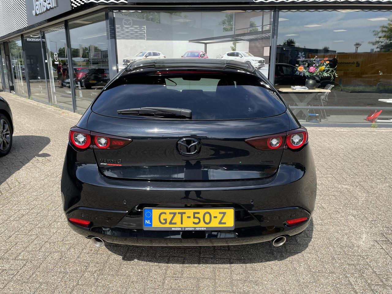 Mazda 3 HB 2.0 e-SkyActiv-X 186 M Hybrid Nagisa , Demovoordeel ¤6.985,-, Jansen Performance uitvoering, Bruin Leder, Bose, Navi, Adap.Cruise, Clima, Apple Carplay, Camera, PDC, HUD, Stoelverwarming, 18" LMV