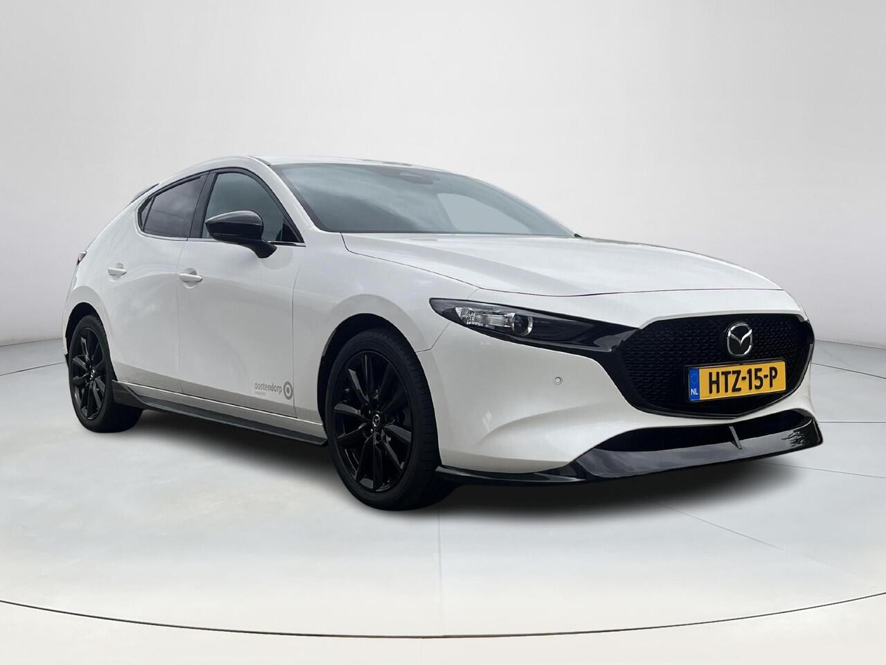 Mazda 3 2.0 e-SkyActiv-X M Hybrid 186 Nagisa | Aero pakket | Alcantara/Leder met stoelgeheugen | Achteruitrijcamera | Bose | HeadupDisplay | Navigatie en draadloze Applecarplay\Androidauto | Verlichte Dorpelbeschermers | Parelmoer Wit