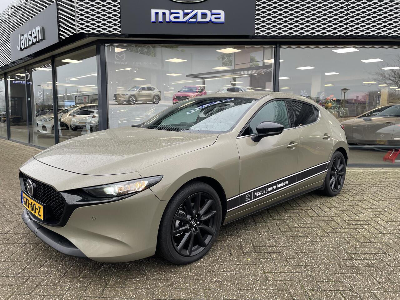 Mazda 3 HB 2.0 e-SkyActiv-G 150 M Hybrid Nagisa , Demovoordeel ¤ 3.040,-, Bruin Leder, Bose, Navi, Adap.Cruise, Clima, Apple Carplay, Camera, PDC, HUD, Stoelverwarming, 18" LMV