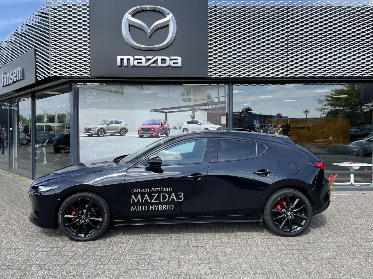 Mazda 3 HB 2.0 e-SkyActiv-X 186 M Hybrid Nagisa , Demovoordeel ¤6.985,-, Jansen Performance uitvoering, Bruin Leder, Bose, Navi, Adap.Cruise, Clima, Apple Carplay, Camera, PDC, HUD, Stoelverwarming, 18" LMV