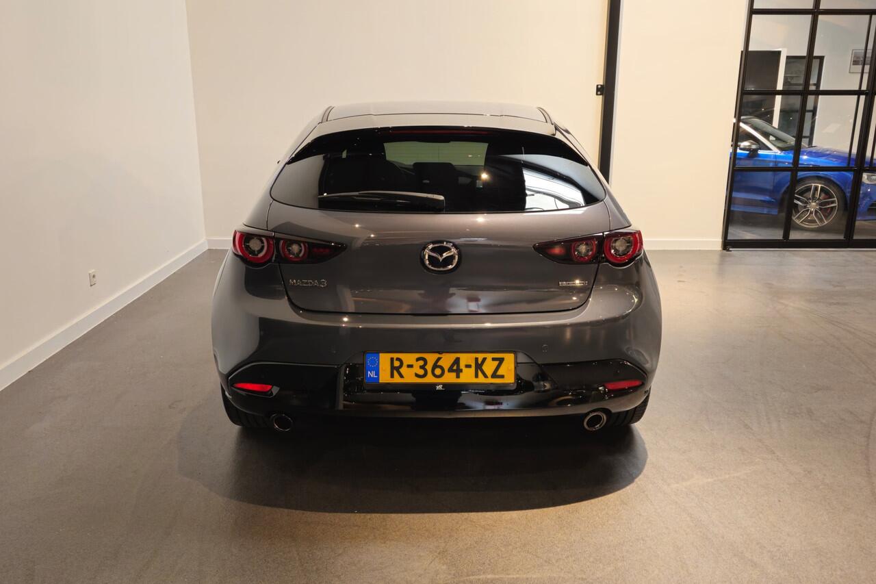 Mazda 3 2.0 e-SkyActiv-G M Hybrid 150 Homura - Stoelverwarming - Apple Carplay/ Android Auto - Adaptive Cruise - Bose audio - Headup display - Afneembare trekhaak