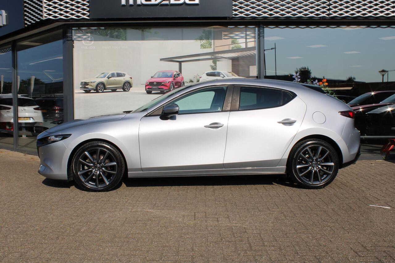Mazda 3 HB 2.0 e-SkyActiv-G M Hybrid 122 Comfort , Automaat, LMV 18 Inch, HUD, Zwart dak, Stuurverwarming, Stoelverwarming, Clima, stoffen bekleding, Apple Carplay, PDC, Camera, Navi, Adap. Cruise