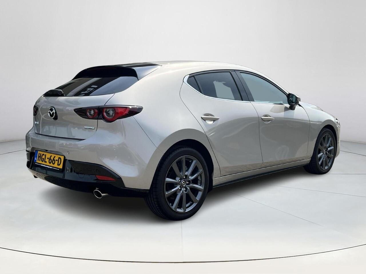 Mazda 3 2.5 e-SkyActiv-G M Hybrid 140 Takumi | Nederlandse auto | Dealeronderhouden | Bose | Automaat | Elektrische verstelbare stoelen met stoelgeheugen | Stoel/stuurverwarming | 360 graden camera | Apple Carplay/Android Auto | Privacy glass | Leder |