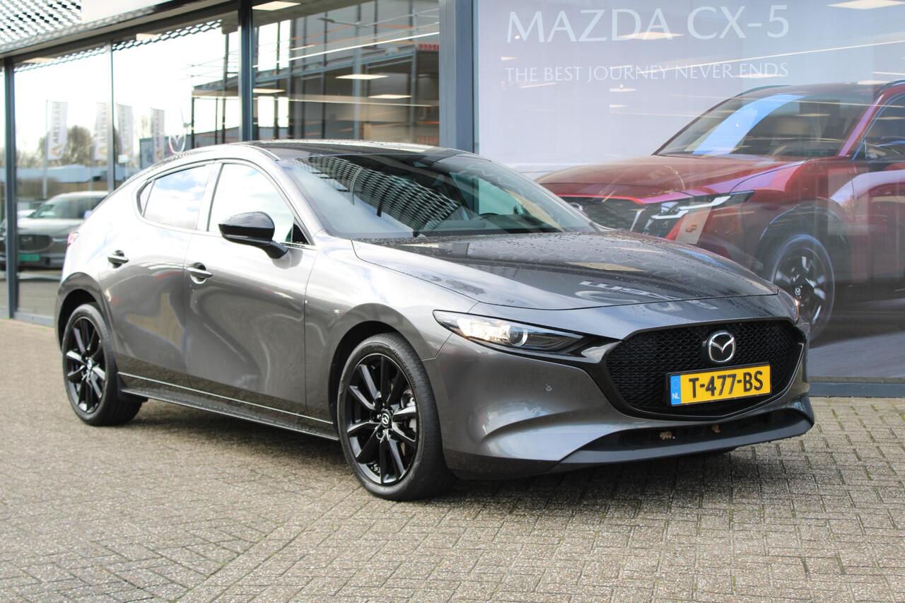 Mazda 3 2.0 e-SkyActiv-G M Hybrid 150 Homura , Adap. Cruise, LMV 18 Inch, PDC, Camera, Navi, Apple Carplay, Clima, Stoelverwarming, HUD, Stoffen bekleding