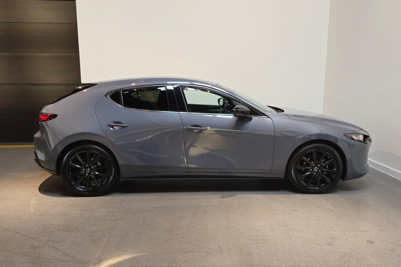 Mazda 3 2.0 e-SkyActiv-G M Hybrid 150 Homura - Stoelverwarming - Apple Carplay/ Android Auto - Adaptive Cruise - Bose audio - Headup display - Afneembare trekhaak