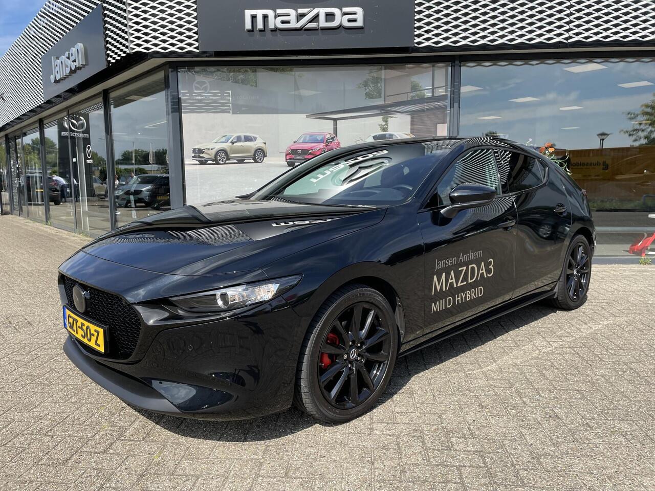 Mazda 3 HB 2.0 e-SkyActiv-X 186 M Hybrid Nagisa , Demovoordeel ¤6.985,-, Jansen Performance uitvoering, Bruin Leder, Bose, Navi, Adap.Cruise, Clima, Apple Carplay, Camera, PDC, HUD, Stoelverwarming, 18" LMV