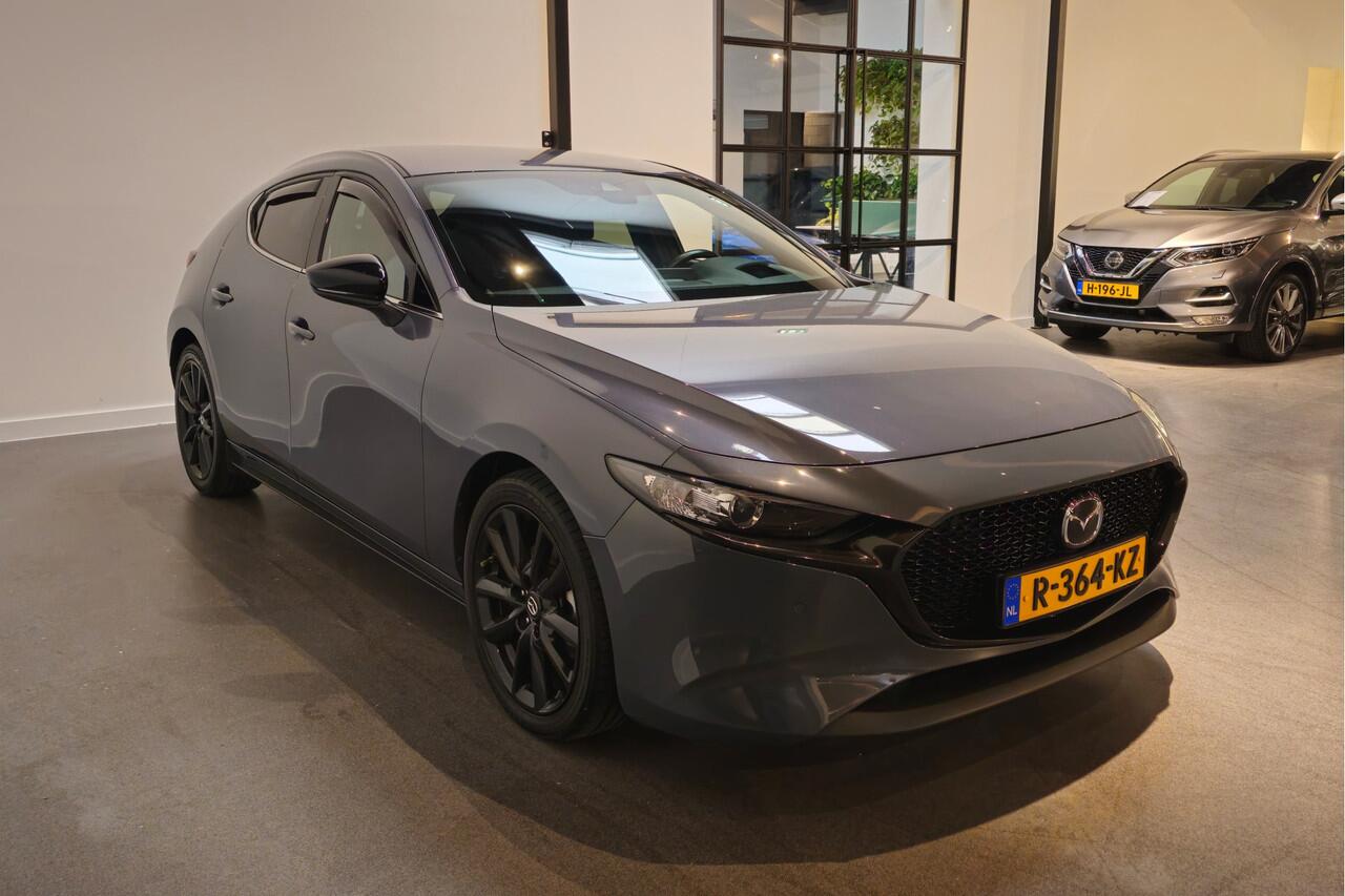 Mazda 3 2.0 e-SkyActiv-G M Hybrid 150 Homura - Stoelverwarming - Apple Carplay/ Android Auto - Adaptive Cruise - Bose audio - Headup display - Afneembare trekhaak