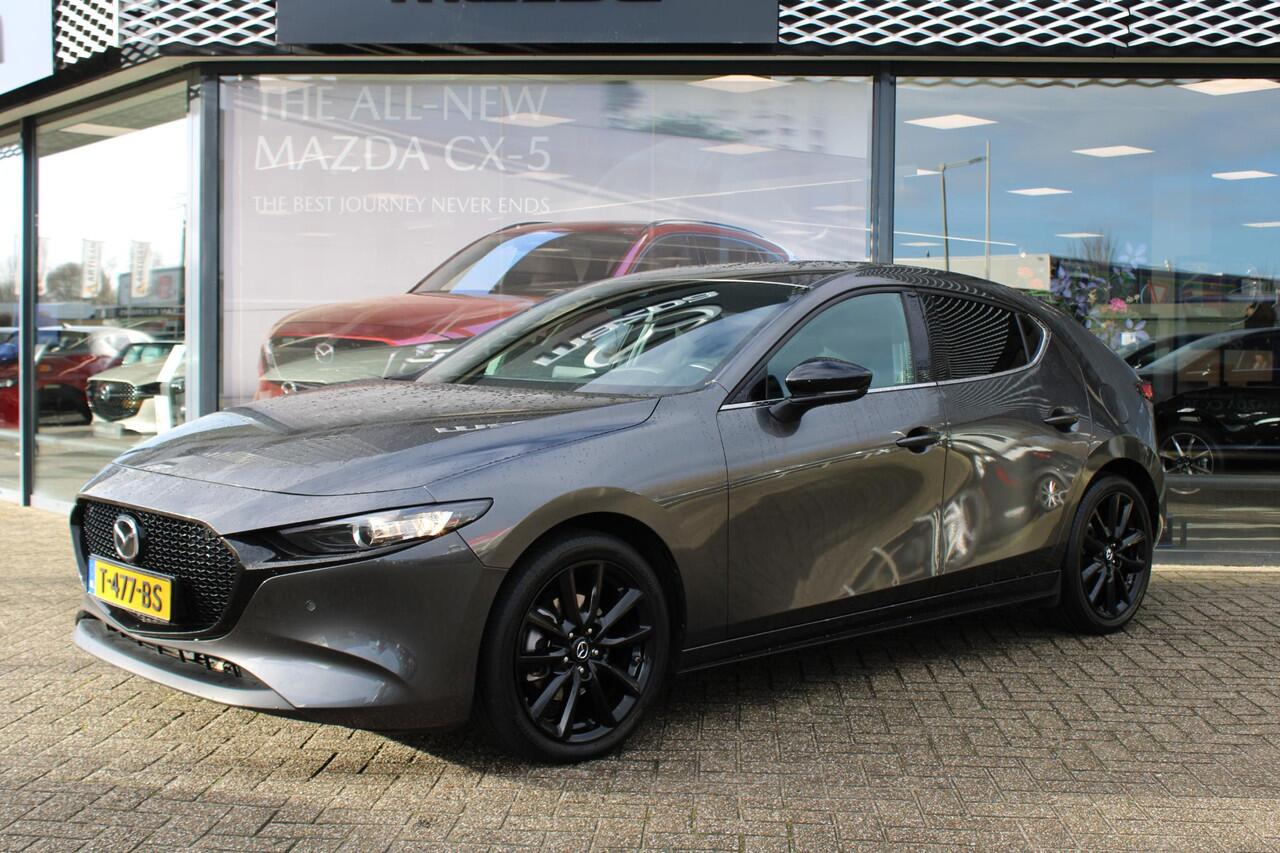 Mazda 3 2.0 e-SkyActiv-G M Hybrid 150 Homura , Adap. Cruise, LMV 18 Inch, PDC, Camera, Navi, Apple Carplay, Clima, Stoelverwarming, HUD, Stoffen bekleding