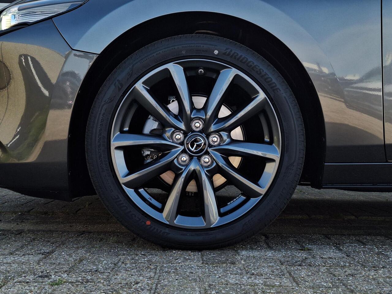 Mazda 3 2.5 e-SkyActiv-G M Hybrid 140 Exclusive-line | 360 Camera | Bose | Dodehoeksensoren | Draadloze Applecarplay en Android Auto | Full LED | Adaptief grootlicht | Adaptieve Cruise Control | Automaat | Stoel en stuurverwarming