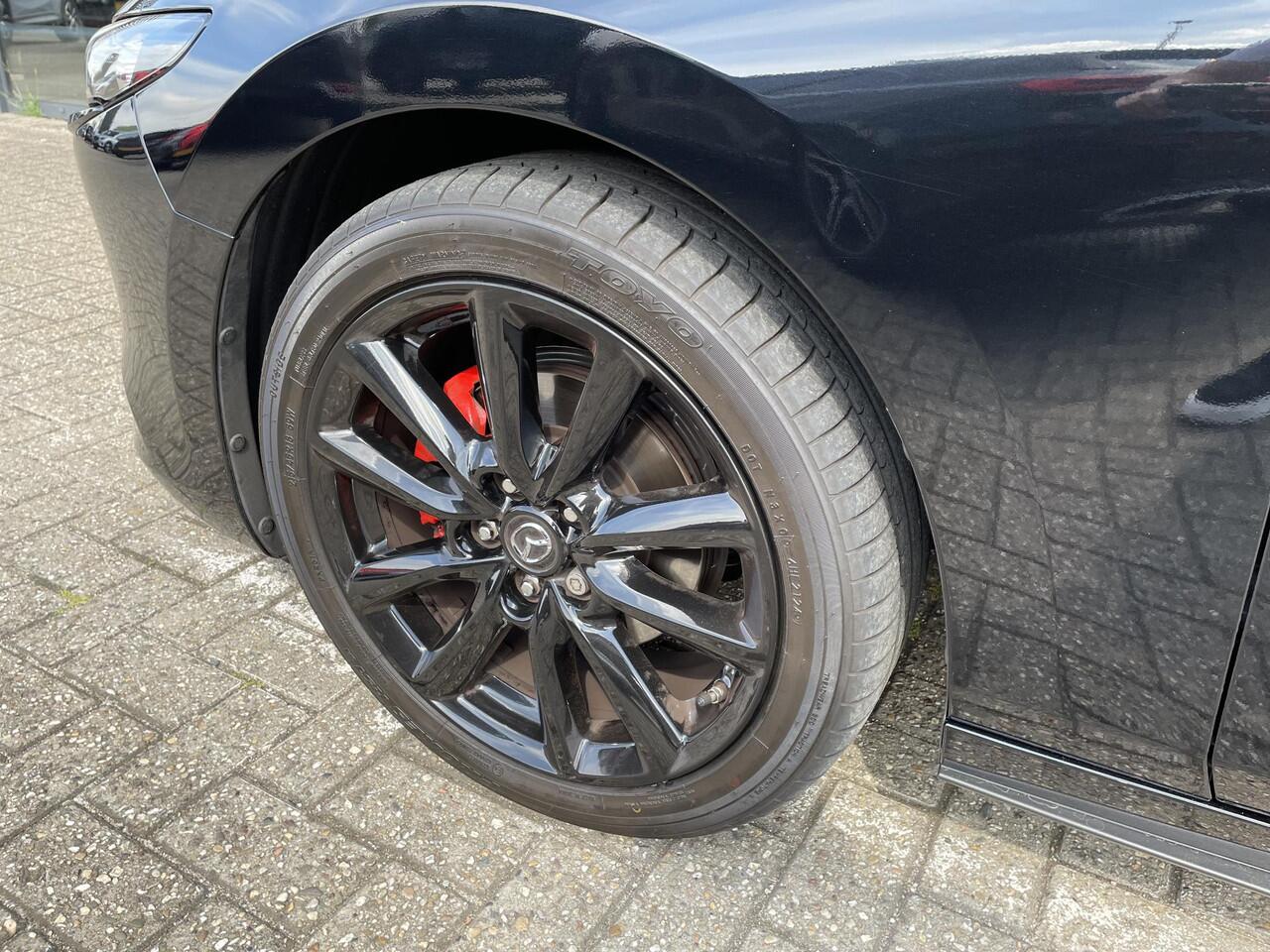 Mazda 3 HB 2.0 e-SkyActiv-X 186 M Hybrid Nagisa , Demovoordeel ¤6.985,-, Jansen Performance uitvoering, Bruin Leder, Bose, Navi, Adap.Cruise, Clima, Apple Carplay, Camera, PDC, HUD, Stoelverwarming, 18" LMV