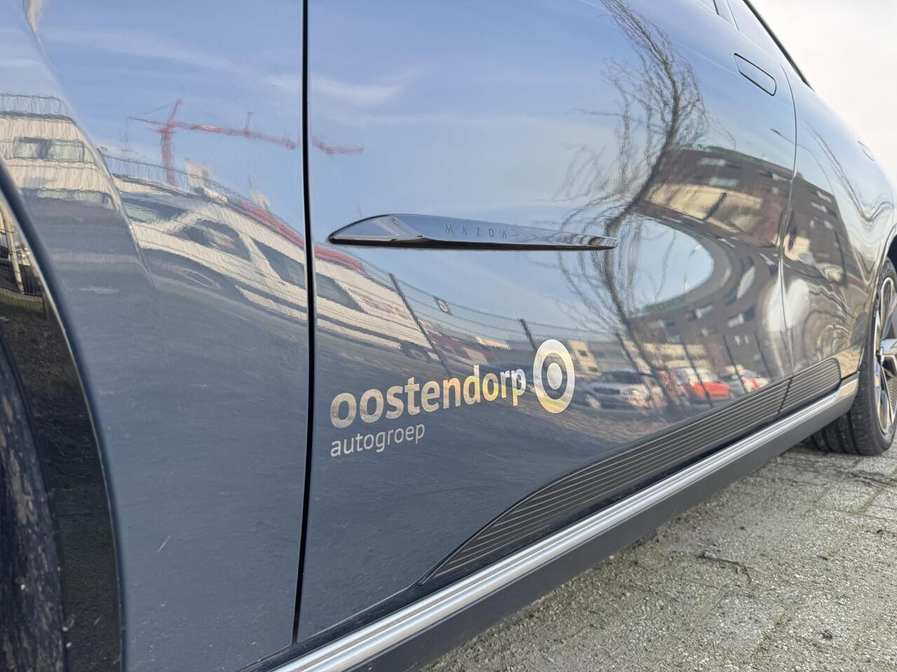 Mazda 6 6e Takumi 68.8 kWh 17% bijtelling | DEMO korting | Elektrisch wegklapbare trekhaak | Stoelverwarming en verkoeling | Apple carplay / Android auto | Adaptieve cruise control | Panoramadak |