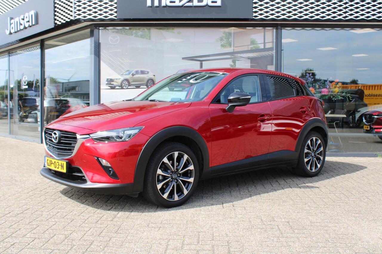 Mazda CX-3 2.0 SkyActiv-G 121 Luxury , Automaar, Trekhaak, Camera, Navi, Apple Carplay, Android Auto, Stoelverwarming, Cruise, LKA, PDC, LMV 18 Inch, Wit Leder