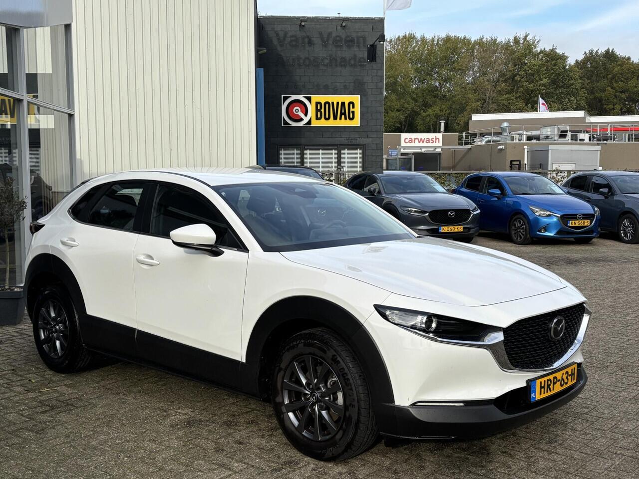 Mazda CX-30 2.5 e-SkyActiv-G M Hybrid Prime-line Navigatie, Apple Carplay / Android Auto, A.Rij-Camera, Cruise Controle Add, Airco, Middenarmsteun, Lichtmetaal.