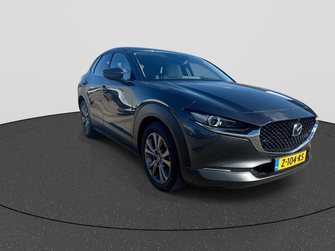 Mazda CX-30 2.0 e-SkyActiv-X M Hybrid Luxury | Rijklaar | Apple carplay | Head-up display | Stoel verwarming