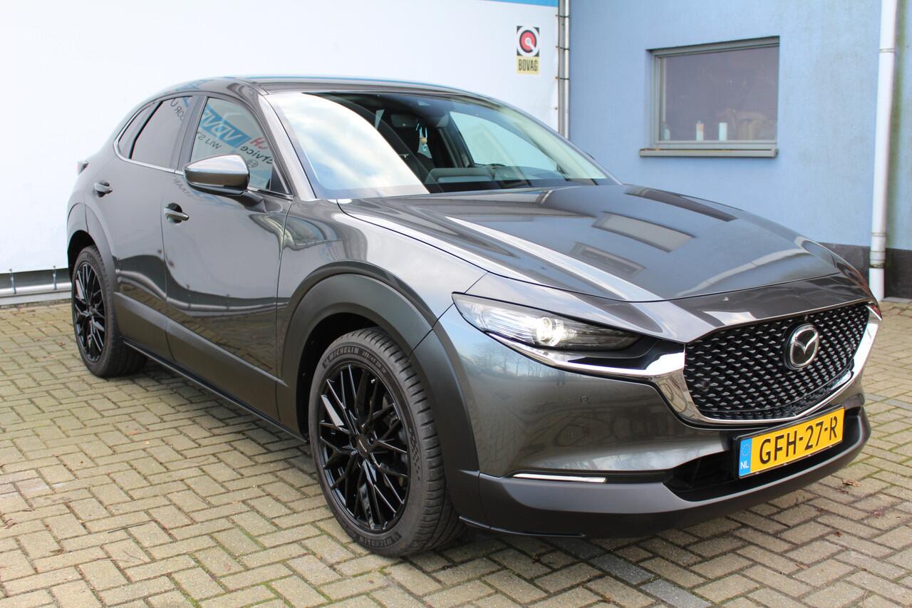Mazda CX-30 2.0 e-SkyActiv-X M Hybrid Comfort | Incl. 12 maanden Garantie | 360* Camera | Adaptive cruise controle | Lane assist | Stoel/Stuur verwarming | Elektrische kofferbakklep | Dodenhoeksensoren | Keyless start | Head-Up Display | Parkeersensoren V+A | Climate