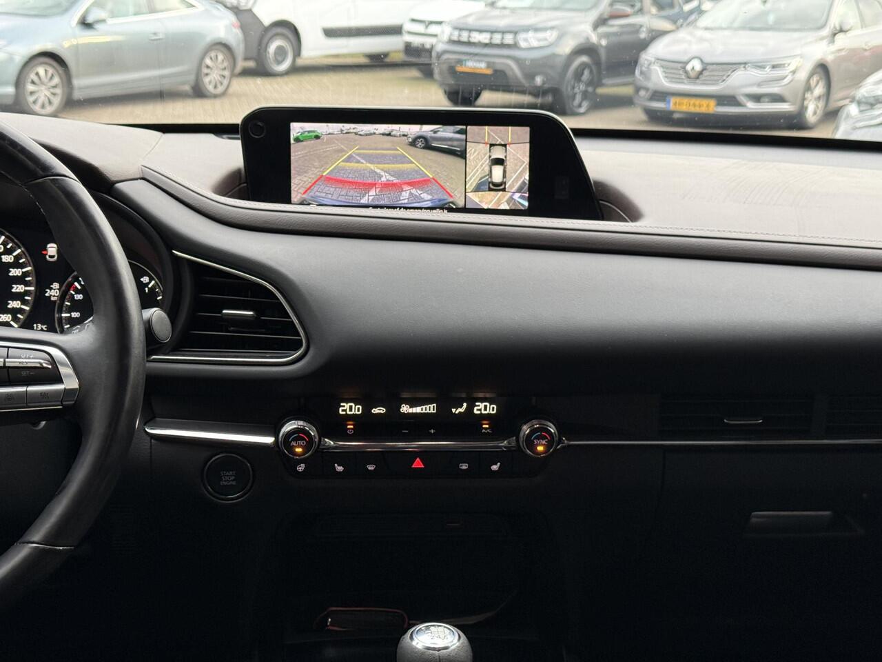 Mazda CX-30 2.0 e-SkyActiv-X M Hybrid Luxury | NAP | elektrisch glazen schuif-/kanteldak | Leer | Stoel & stuur verwarming | 360 graden camera | Bose Audio | Memory Stoelen |