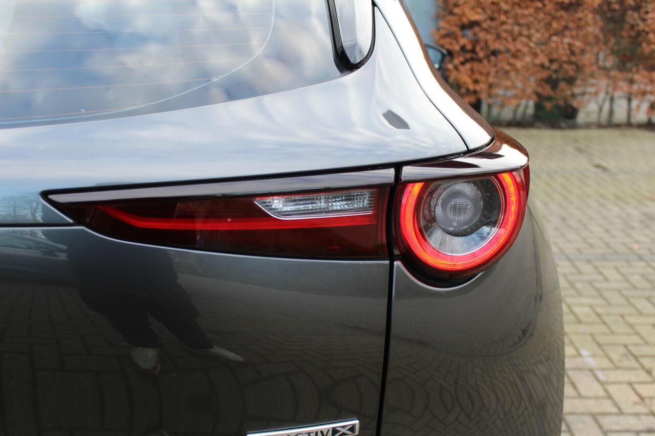 Mazda CX-30 2.0 e-SkyActiv-X M Hybrid Comfort | Incl. 12 maanden Garantie | 360* Camera | Adaptive cruise controle | Lane assist | Stoel/Stuur verwarming | Elektrische kofferbakklep | Dodenhoeksensoren | Keyless start | Head-Up Display | Parkeersensoren V+A | Climate