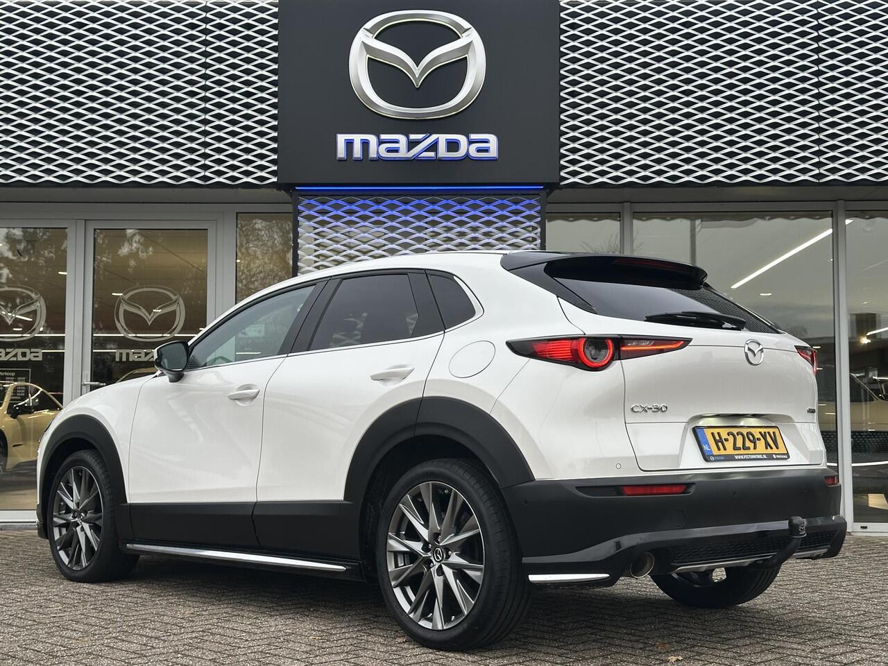 Mazda CX-30 2.0 e-SkyActiv-X M Hybrid Luxury AUTOMAAT | SCHUIFKANTELDAK | 360 CAMERA | AFNEEMBARE TREKHAAK | AERO PACK |