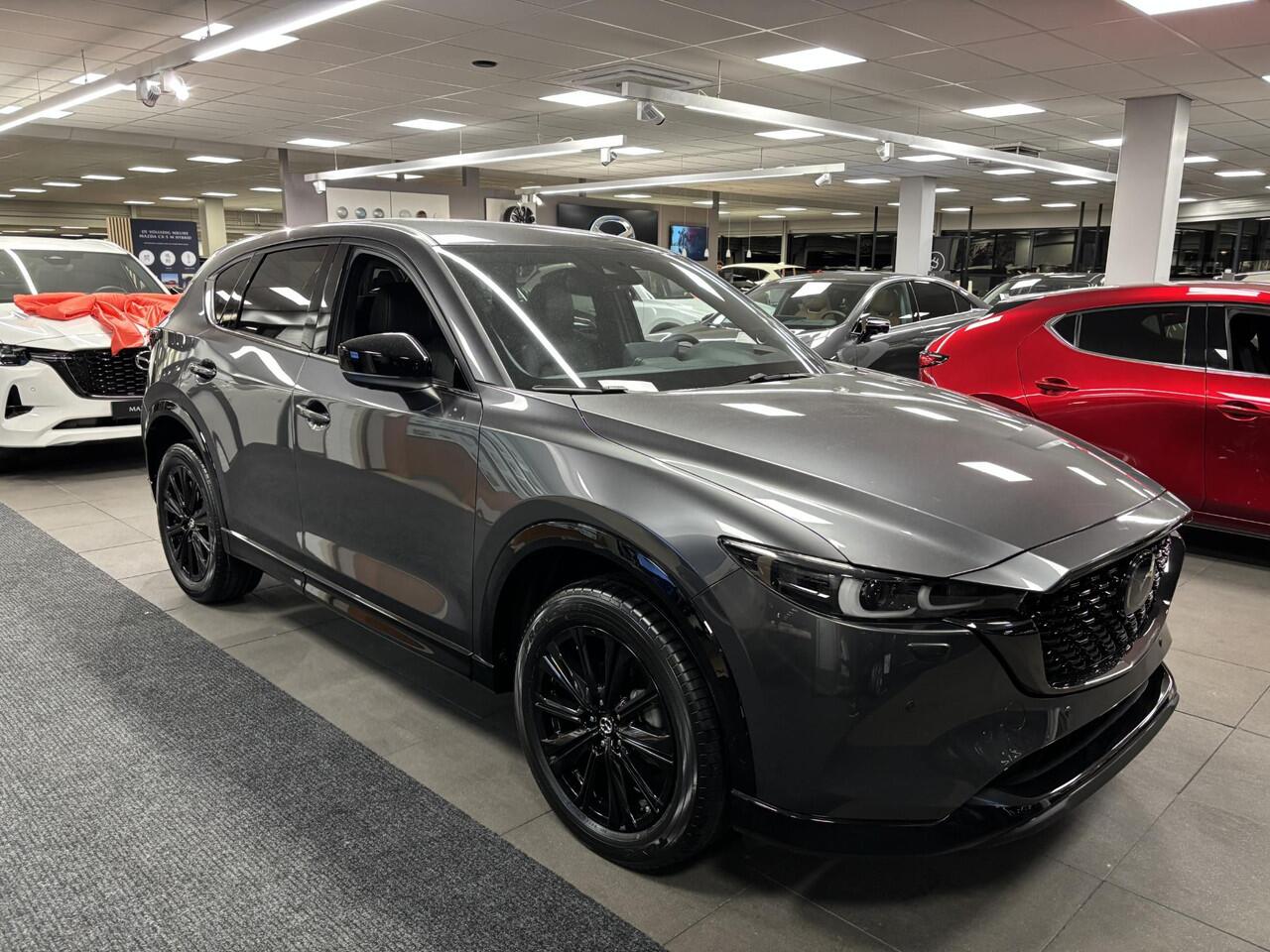 Mazda CX-5 2.0 e-SkyActiv-G M Hybrid 165 Homura , Nieuwe Auto, 10 KM, Registratievoordeel ¤ 5.000-, Leder Pack, Adap.Cruise, Navi, Apple Carplay, 360 Camera, PDC, HUD, Stoelverwarming/ventilatie, 19" LMV