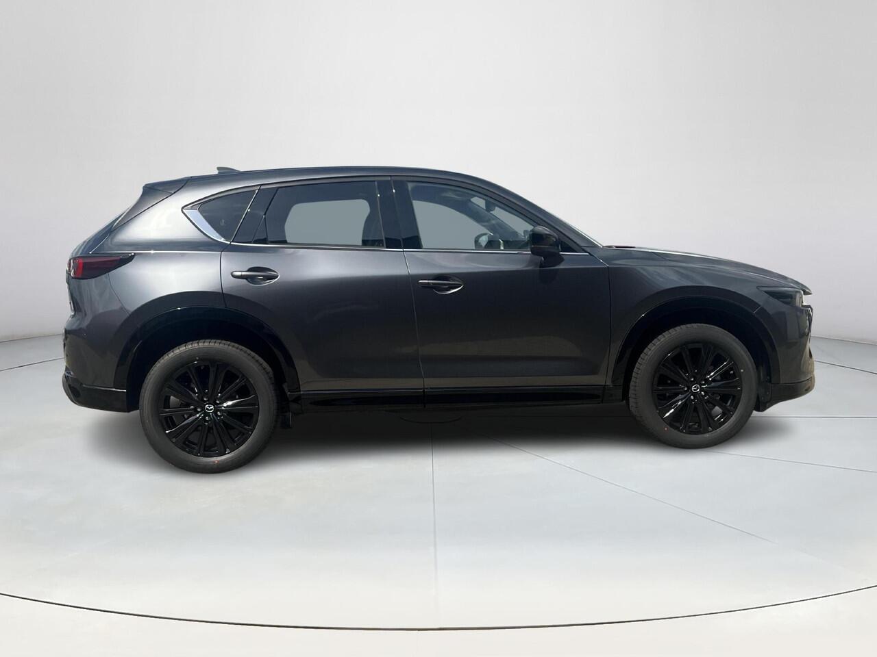 Mazda CX-5 2.0 e-SkyActiv-G M Hybrid 165 Homura ¤ 7.500,- korting | Elektrische stoelen met geheugenstand | Stoelkoeling en Verwarming | Stuurverwarming | 360 Camera | Bose | Adaptieve cruise control | Head-up Display |