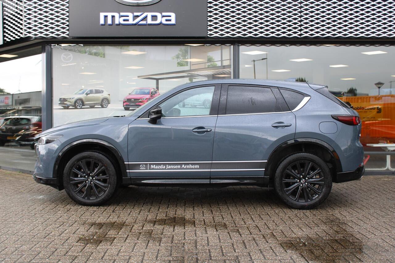 Mazda CX-5 2.0 e-SkyActiv-G M Hybrid 165 Homura & Comfort Pack, Demovoordeel ¤ 7.390-, Navi, Adap.Cruise, Clima, Leder, Apple Carplay, 360 Camera, PDC, HUD, Stoelverwarming/ventilatie, 19" LMV, Elek.Achterklep