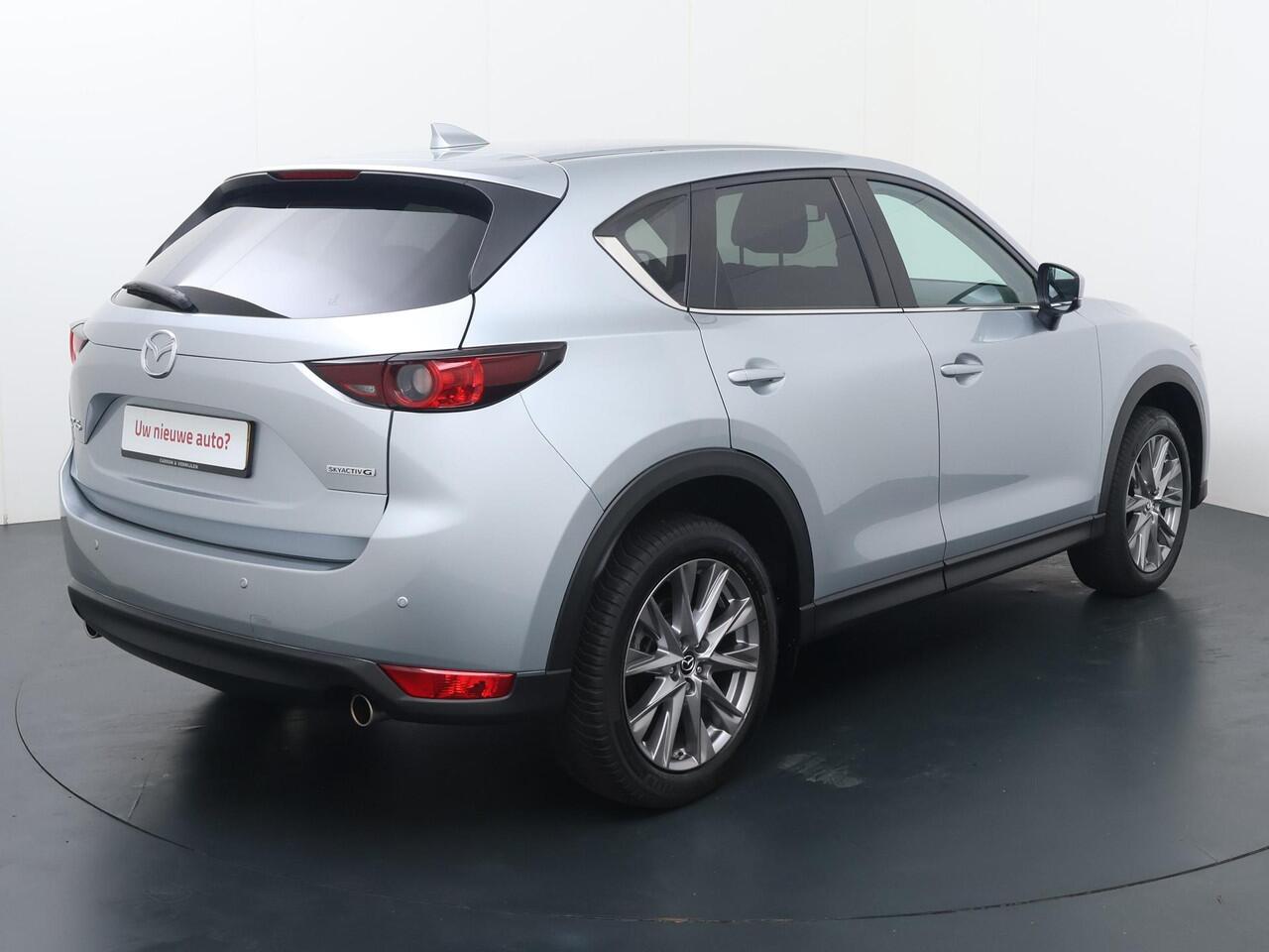 Mazda CX-5 2.0 SkyActiv-G 165 Comfort | 165 PK | Automaat | Multifunctioneel stuurwiel | Spraakbediening | Cruise control | Automatische verlichting | Dab+ | Bluetooth | Navigatie | PDC Voor + Achter | Stuurverwarming | Stoelverwarming | Climate | Autohold |