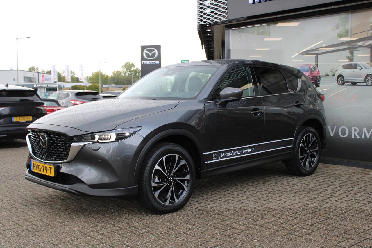 Mazda CX-5 2.0 e-SkyActiv-G M Hybrid 165 Exclusive-Line , Demovoordeel ¤ 7.100,-, Black Comfort Pack, Navi, Adap.Cruise, Clima, Leder, Apple Carplay, 360 Camera, PDC, HUD, Stoelverwarming/ventilatie, 19" LMV