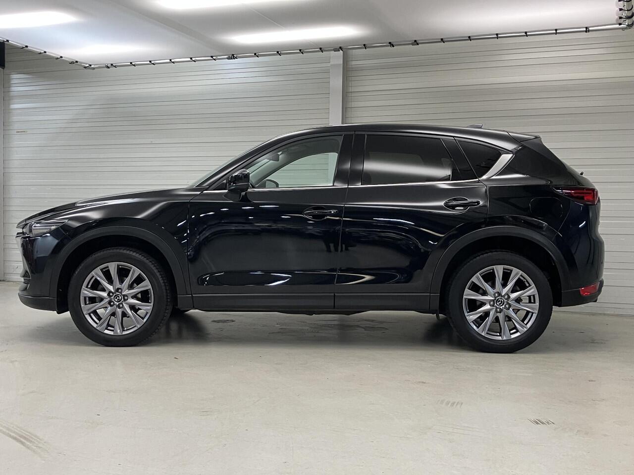Mazda CX-5 2.0 SkyActiv-G 165 Business Luxury / Eerste Eigenaar / Trekhaak 2000 KG / Lederen Bekleding / Memory Seats / HUD / Bose Audio / Stoelverwarming en Ventilatie / Navigatie / Camera /