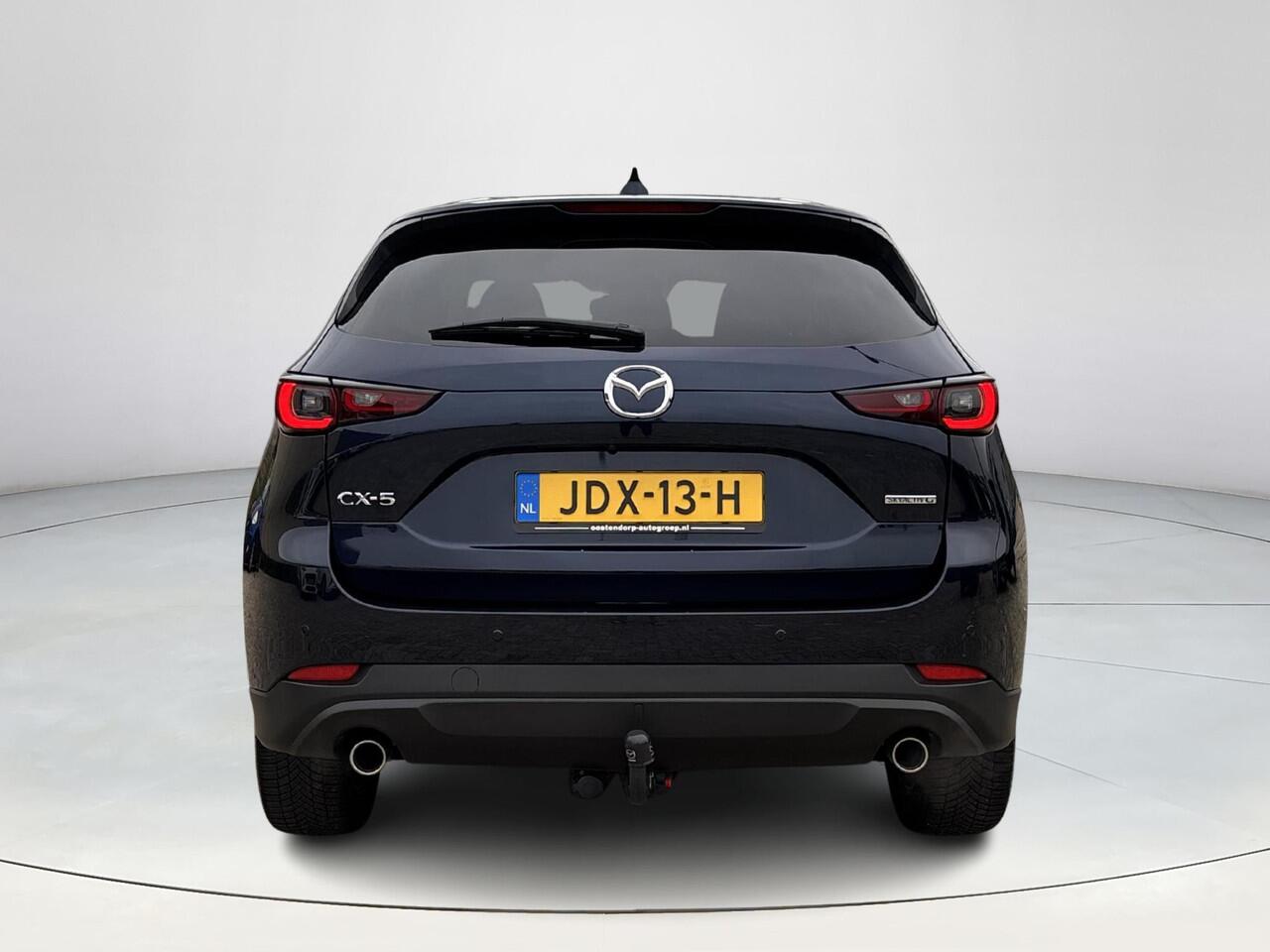 Mazda CX-5 2.0 SkyActiv-G 165 Comfort | Stoel/stuur verwarming | Trekhaak | All-season banden | Achteruitrijcamera | Navigatie | Keyless entry/start |