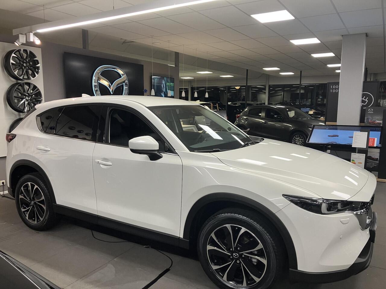 Mazda CX-5 2.0 e-SkyActiv-G M Hybrid 165 Exclusive-Line , Nieuwe Auto, 10 KM, Registratievoordeel ¤ 5.000-, Leder Pack, Adap.Cruise, Navi, Apple Carplay, 360 Camera, PDC, HUD, Stoelverwarming/ventilatie, 19" LMV