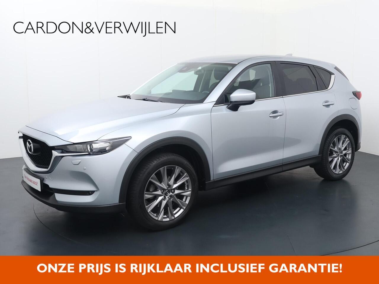 Mazda CX-5 2.0 SkyActiv-G 165 Comfort | 165 PK | Automaat | Multifunctioneel stuurwiel | Spraakbediening | Cruise control | Automatische verlichting | Dab+ | Bluetooth | Navigatie | PDC Voor + Achter | Stuurverwarming | Stoelverwarming | Climate | Autohold |