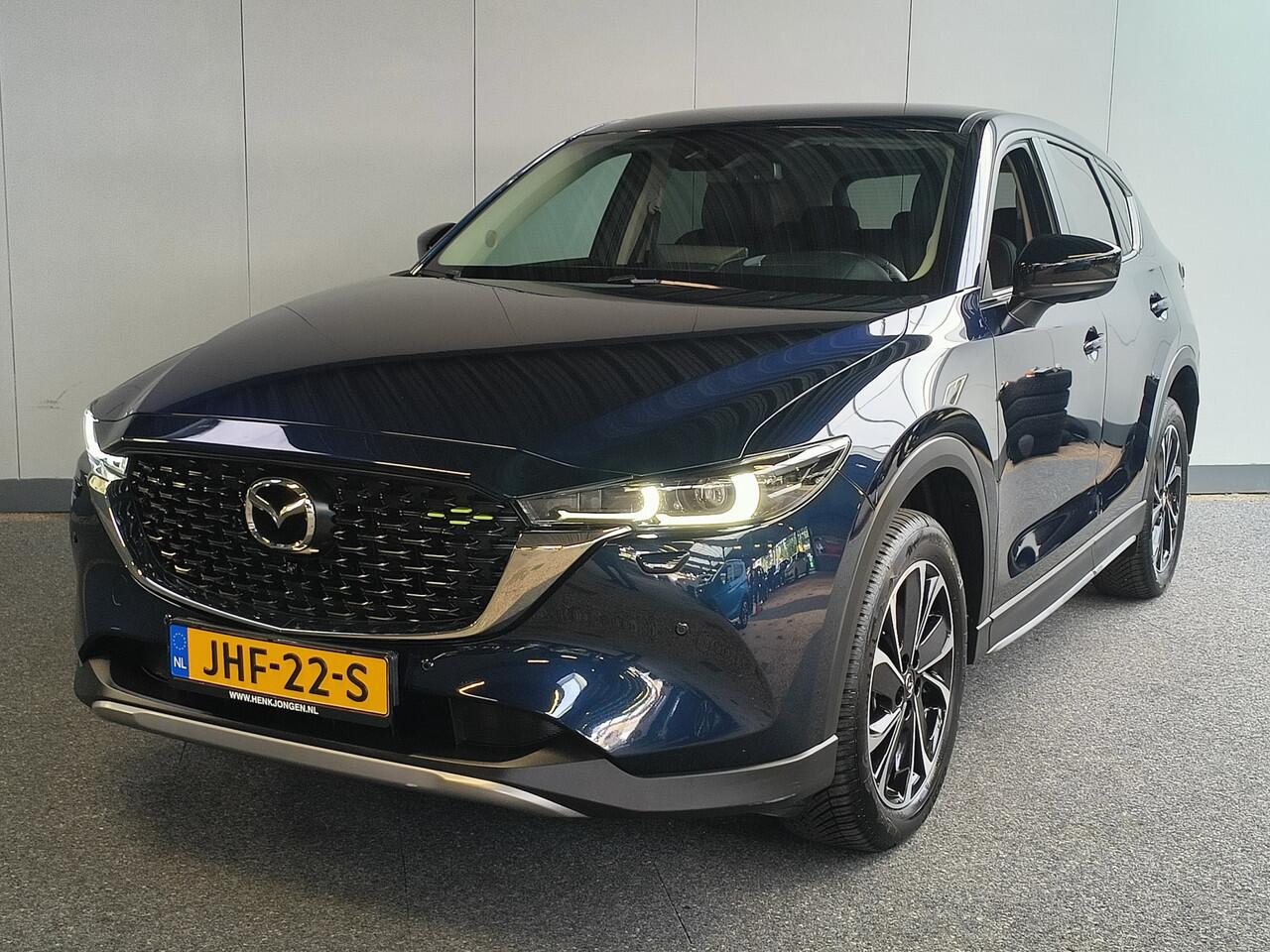 Mazda CX-5 2.0 e-SkyActiv-G M Hybrid 165 Newground AUTOMAAT uit 2023 Rijklaar + 12 maanden Bovag-garantie Henk Jongen Auto's in Helmond, al 50 jaar service zoals 't hoort!