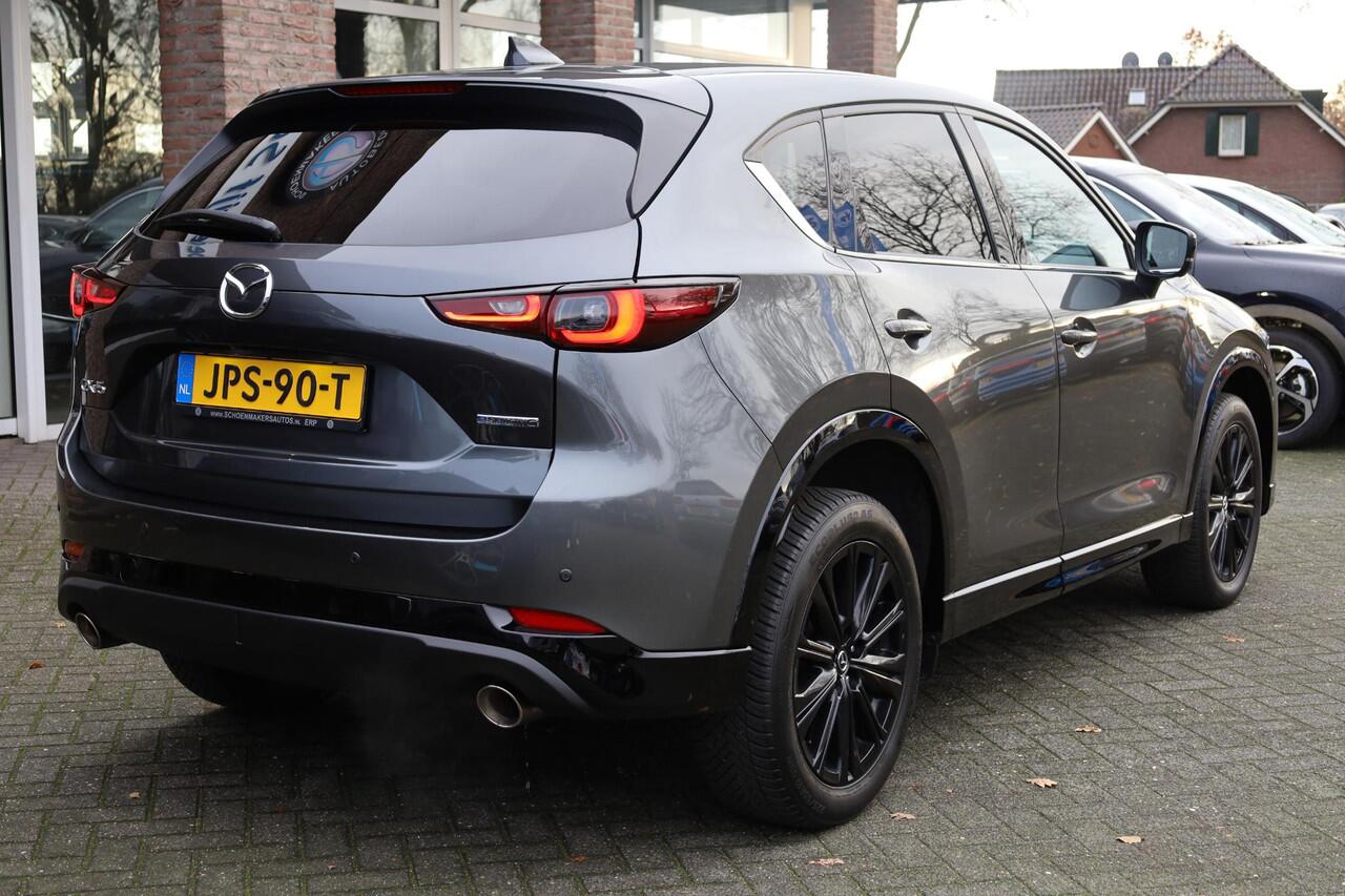 Mazda CX-5 2.0 e-SkyActiv-G M Hybrid 165 Homura 360-CAMERA STOELKOELING STUURVERW. 4xSTOELVERW. HUD/ADD LEER MEMORY BOSE CARPLAY DAB NAVI ELEK.LAADKLEP 19"LMV 2xKEYLESS ENZ!