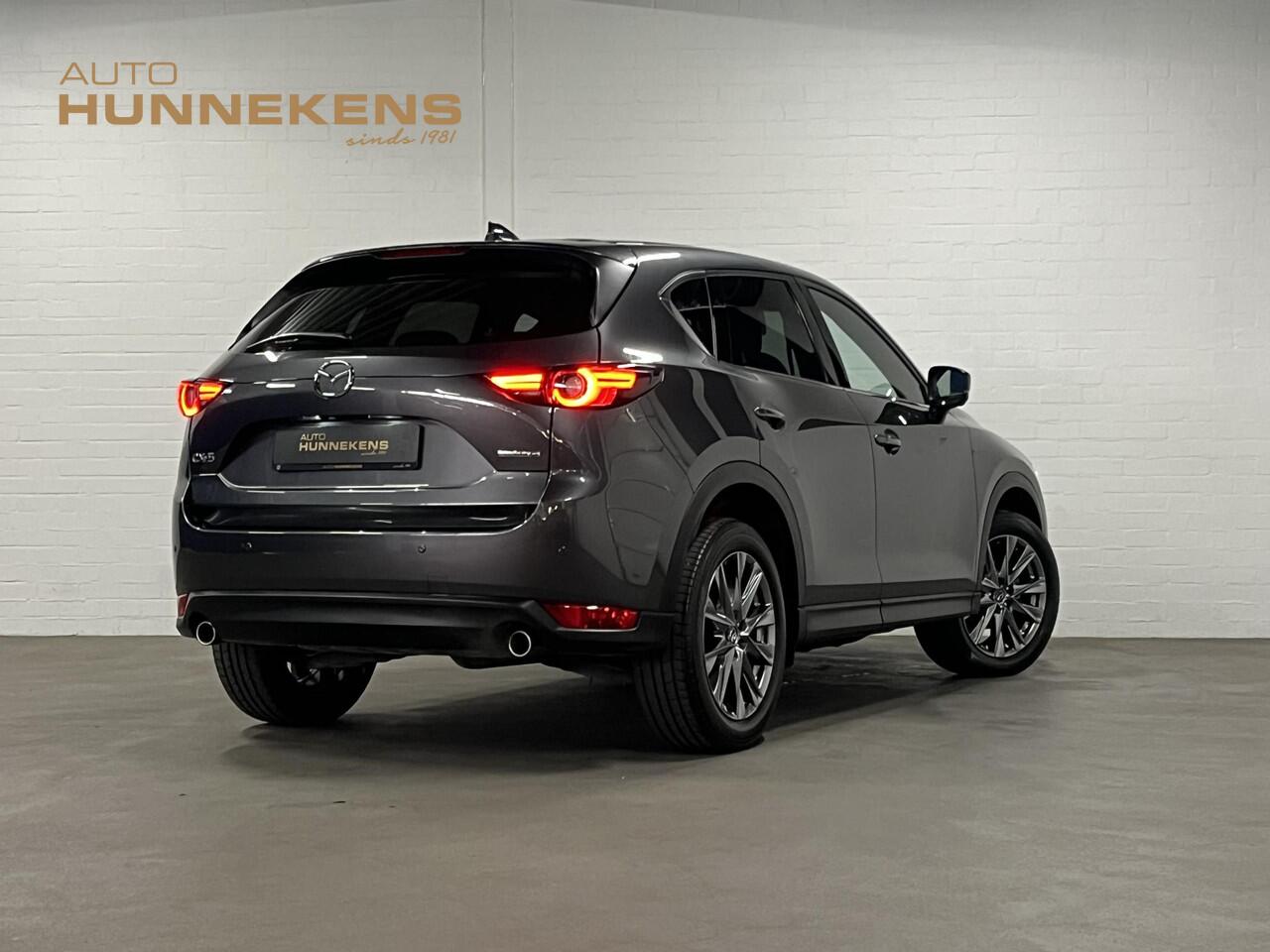 Mazda CX-5 2.0 SkyActiv-G 165 | Open dak | Adapt. Cruise control | Stoelventilatie | BOSE | Stoel-/Stuurverwarming |