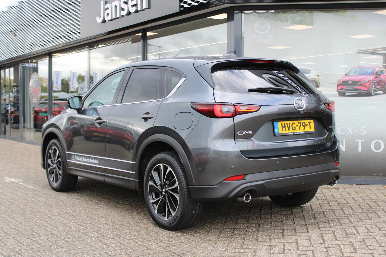 Mazda CX-5 2.0 e-SkyActiv-G M Hybrid 165 Exclusive-Line , Demovoordeel ¤ 5.000,-, Black Comfort Pack, Navi, Adap.Cruise, Clima, Leder, Apple Carplay, 360 Camera, PDC, HUD, Stoelverwarming/ventilatie, 19" LMV
