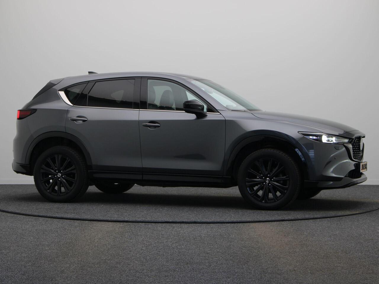 Mazda CX-5 2.0 e-SkyActiv-G M Hybrid 165 Homura | Lederen Bekleding | Elektrische Stoelverstelling met memory | Bose Audio | Stoel en Stuur verwarming |