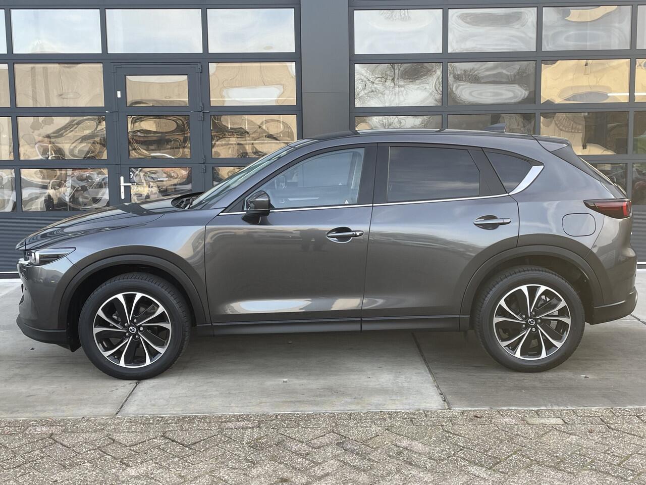 Mazda CX-5 2.0 e-SkyActiv-G M Hybrid 165 Advantage | AUTOMAAT | TREKHAAK | APPLE CARPLAY | 12.444KM!!! NAVI | LED 19 INCH LMV | WINTERPAKKET | RONDOMZICHT CAMERA | 2000 KG TREKGEWICHT