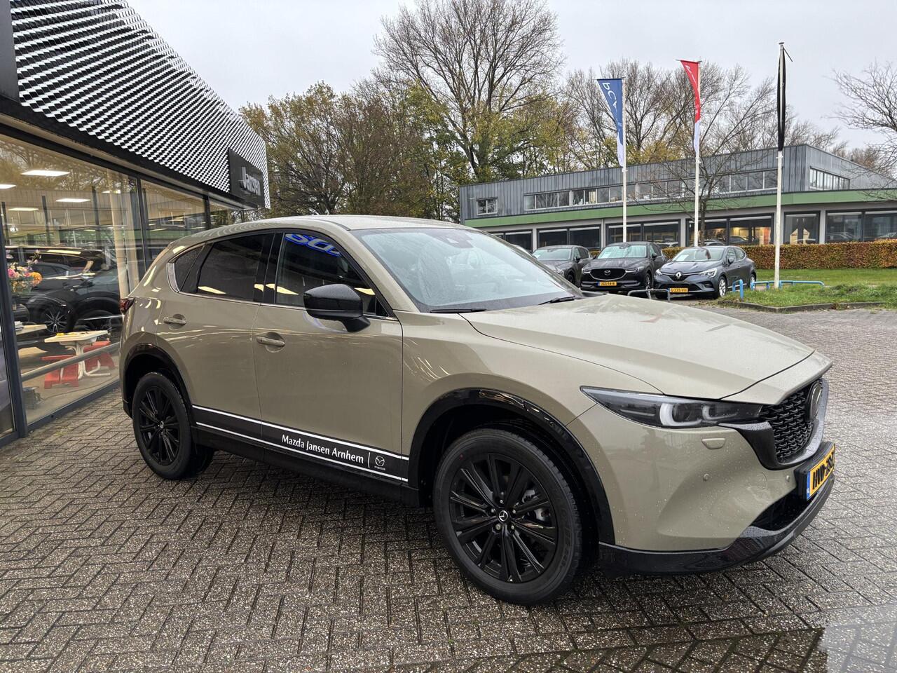 Mazda CX-5 2.0 e-SkyActiv-G M Hybrid 165 Homura , Demovoordeel ¤ 5.000-, Leder Pack, Adap.Cruise, Navi, Apple Carplay, 360 Camera, PDC, HUD, Stoelverwarming/ventilatie, 19" LMV