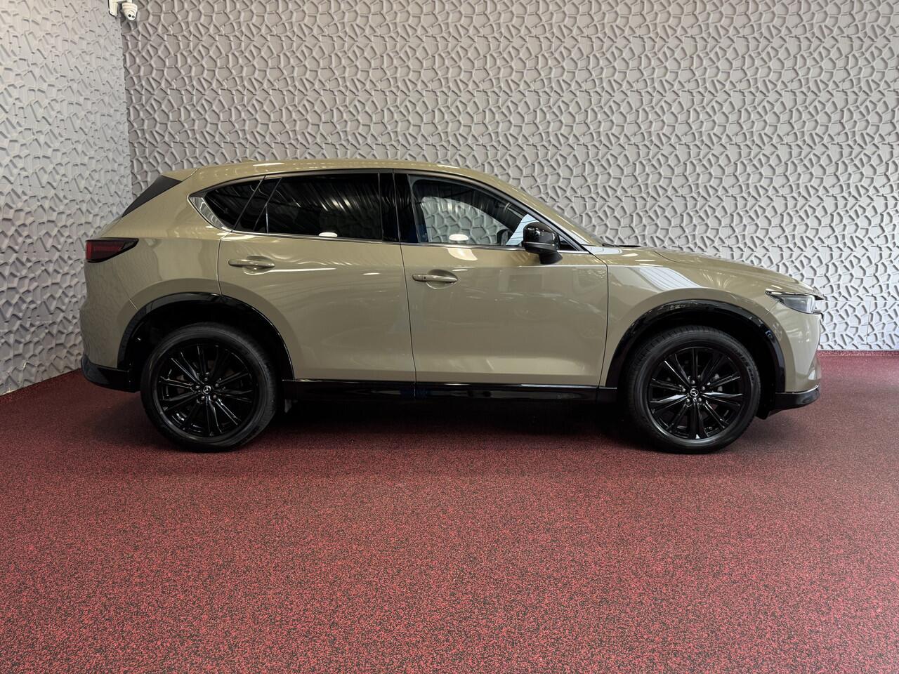 Mazda CX-5 2.0 E SkyActiv MHEV 165 HOMURA LEER/ALCANTARA ELEK.KLEP ADAP.CRUISE 19''LMV HEAD-UP 360.CAMERA FULL LED CARPLAY NAVI STOEL/STUUR VERW. BOSE 09/2024