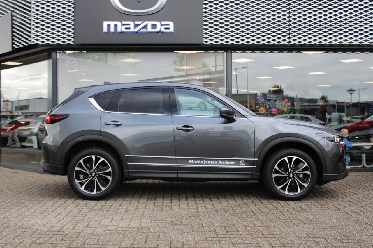 Mazda CX-5 2.0 e-SkyActiv-G M Hybrid 165 Exclusive-Line , Demovoordeel ¤ 7.100,-, Black Comfort Pack, Navi, Adap.Cruise, Clima, Leder, Apple Carplay, 360 Camera, PDC, HUD, Stoelverwarming/ventilatie, 19" LMV