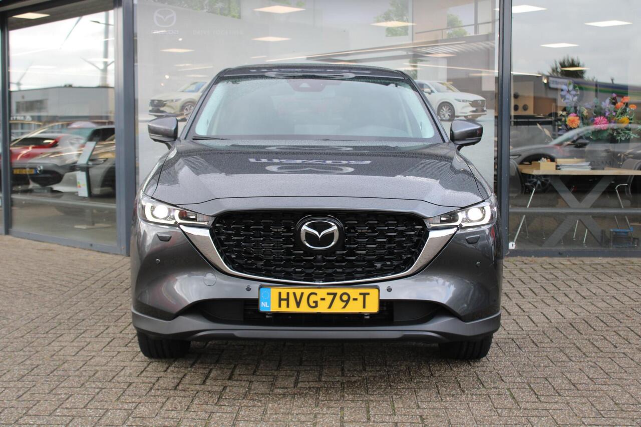 Mazda CX-5 2.0 e-SkyActiv-G M Hybrid 165 Exclusive-Line , Demovoordeel ¤ 5.000,-, Black Comfort Pack, Navi, Adap.Cruise, Clima, Leder, Apple Carplay, 360 Camera, PDC, HUD, Stoelverwarming/ventilatie, 19" LMV