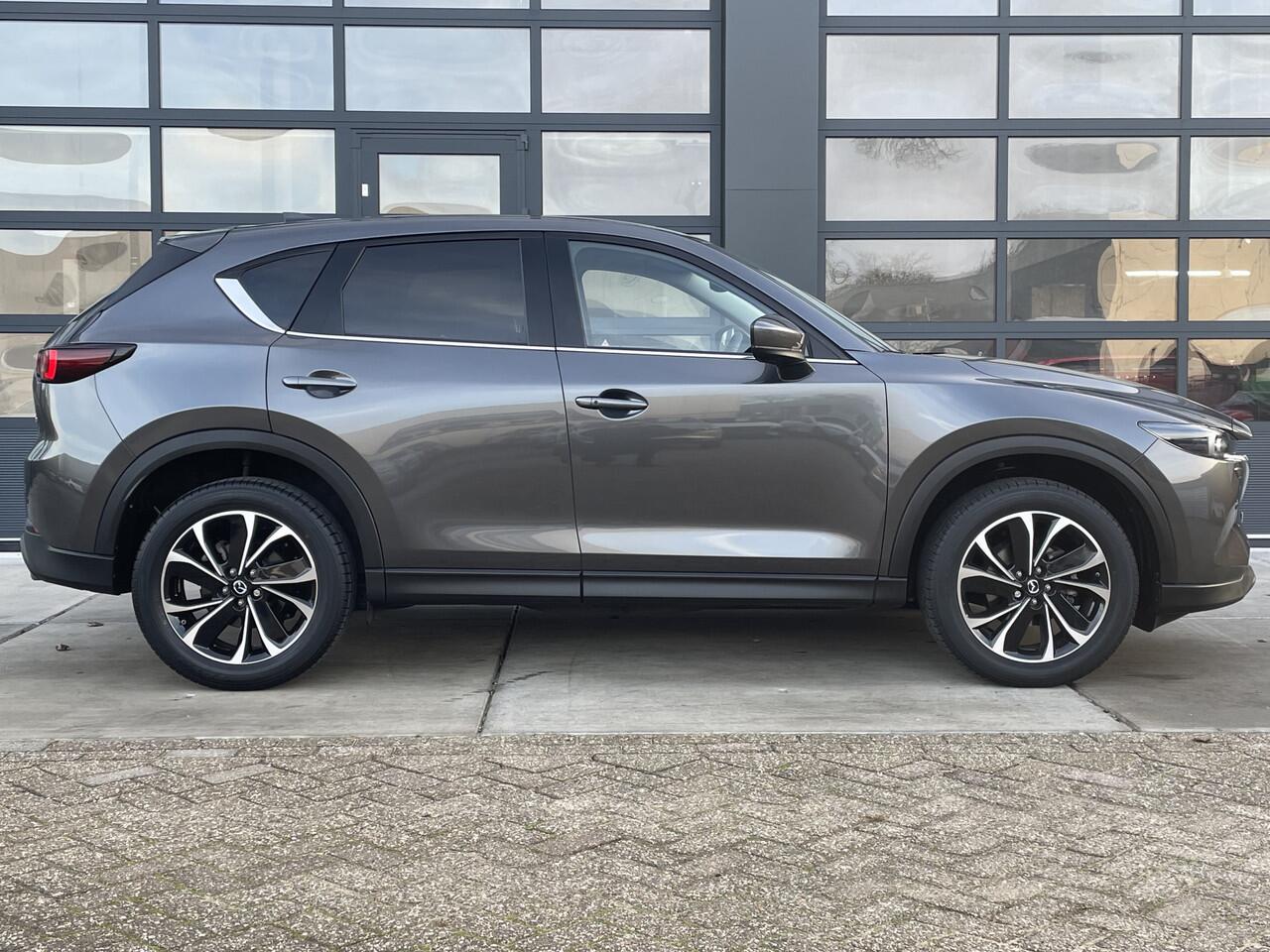 Mazda CX-5 2.0 e-SkyActiv-G M Hybrid 165 Advantage | AUTOMAAT | TREKHAAK | APPLE CARPLAY | 12.444KM!!! NAVI | LED 19 INCH LMV | WINTERPAKKET | RONDOMZICHT CAMERA | 2000 KG TREKGEWICHT